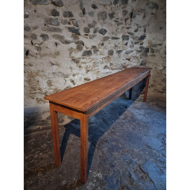 Vintage oak work table dating from the 1950s, originating from a former hospital workshop in Vichy, France. The table...