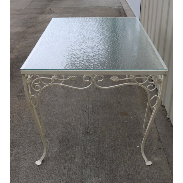 A very nice set in the John Salterini style. I was unable to locate a maker's mark. I love the scroll work and leaves! The...