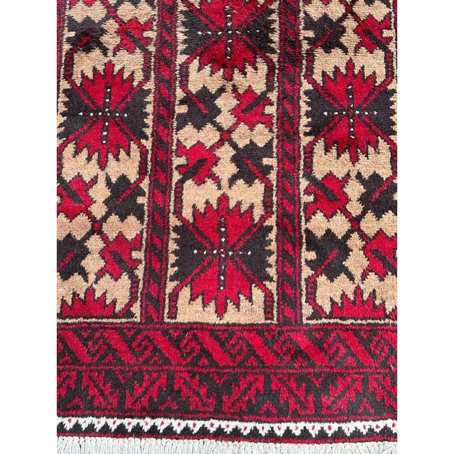 Pretty vintage Turkmen Baluch rug with beautiful tribal design and nice colours, entirely hand knotted with wool on wool...