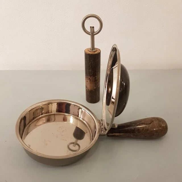Curious pair: bottle opener and "silent butler" for table waste, crown caps etc. Typical design by Aldo Tura, combining...