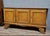 Art Deco oak sideboard, circa 1940 Opens at the front with three framed doors parquet-finished top Stylized legs. Height:...