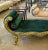 Stunning lovely dark green bench/settee. This is tufted in high end designer green velvet fabric. The frame has gold leaf...