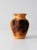 This vintage handmade burl wood vase showcases a striking contrast between its smooth, polished surface and the deep,...