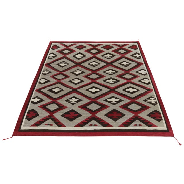 Handwoven in fine quality wool, an 8x10 ode to Navajo Kilim rug blending tribal sensibilities with impeccable modern...