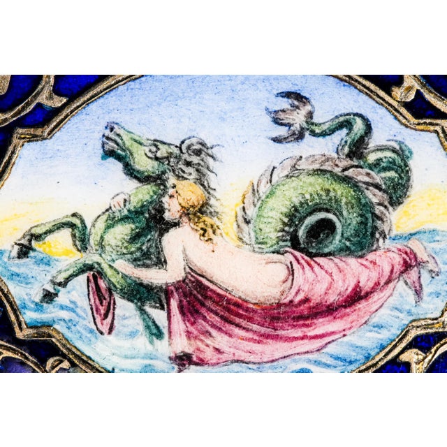 This extraordinary 19th-century Continental European 800 silver snuff box is a jewel-like example of the luxurious objets...