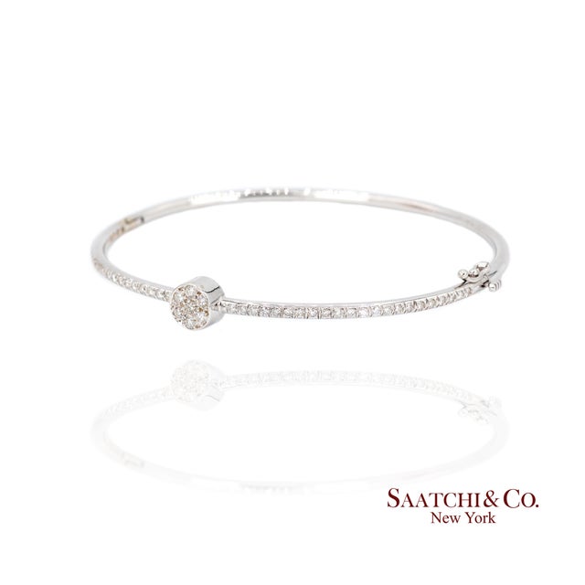 18k White Gold Diamond Bracelet Metal Type: 18k White Gold Total Item Weight: 9.8 Grams Length: 63.0 mm Width: 7.0 mm...
