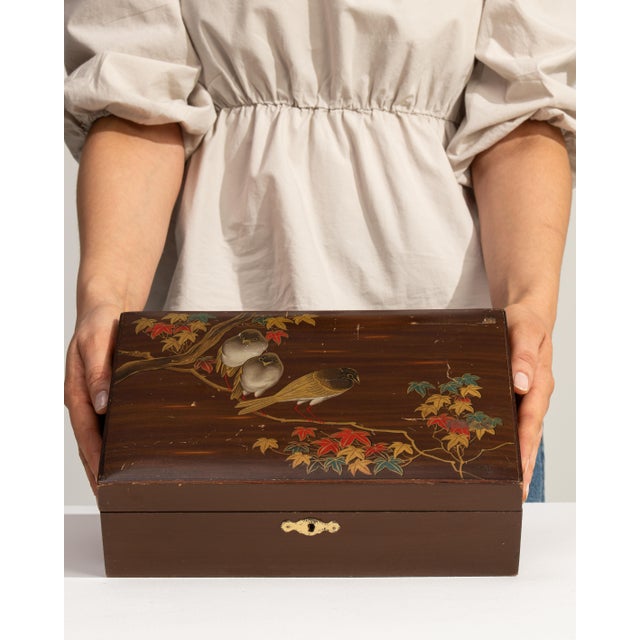 This early 20th century box from China is finished in brown, worked in wood. Its form follows honest, well-proportioned...