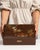 This early 20th century box from China is finished in brown, worked in wood. Its form follows honest, well-proportioned...