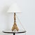 A magnificent Italian giltwood altar candlestick from the 19th century, recently electrified as a table lamp to bring that...