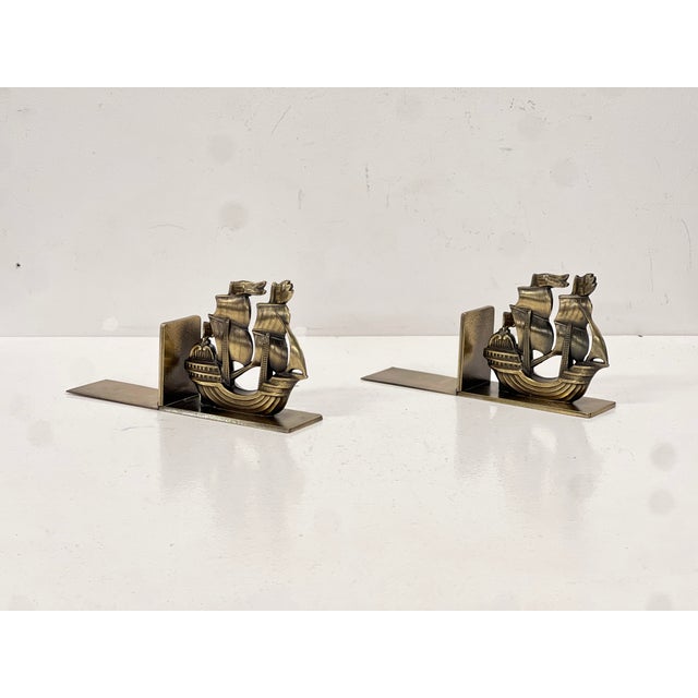 Beautiful pair of bronze (or possibly brass) bookends featuring elegant ship motifs. Crafted in Sweden during the 1930s,...