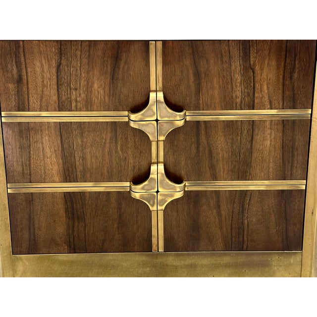 A beautiful brass and walnut Mastercraft dimunitive chest of drawers produced in the 1970’s. Nice graining to the walnut...
