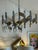 Italian midcentury modern large 1970s brass and chrome 15 light "Chevron" chandelier designed by Gaetano Sciolari. CD...