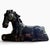 Elegant vintage black horse sculpture with a sleek, highly stylized silhouette and glossy finish. The horse is rendered in...