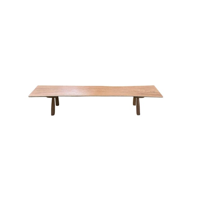 This refined solid teak wood bench embodies a quiet, architectural elegance—where simplicity of form meets the natural...