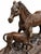 Elegant vintage equestrian table lamp featuring a detailed bronze-tone sculpture of a mare and foal on a dark wooden base....