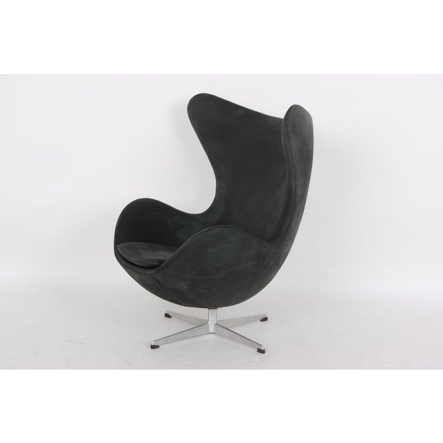 Reupholstered armchair, model "The Egg," designed by Arne Jacobsen in 1958. Shown here is an older version, manufactured...