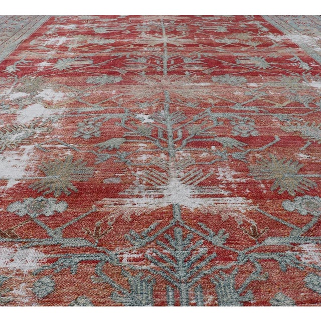 This antique Persian Bibikabad rug has been hand-knotted in wool. The rug features a unique sub-geometric multi-medallion...