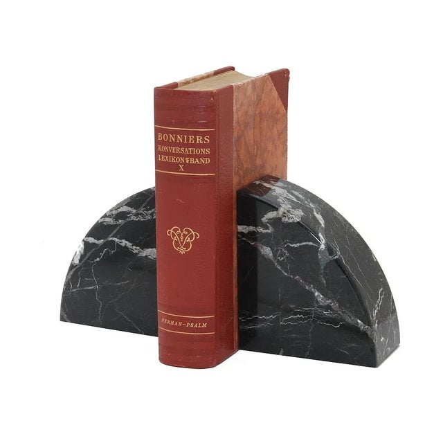 A pair of Cerasus Collection Black Zebra Marble Bookends.