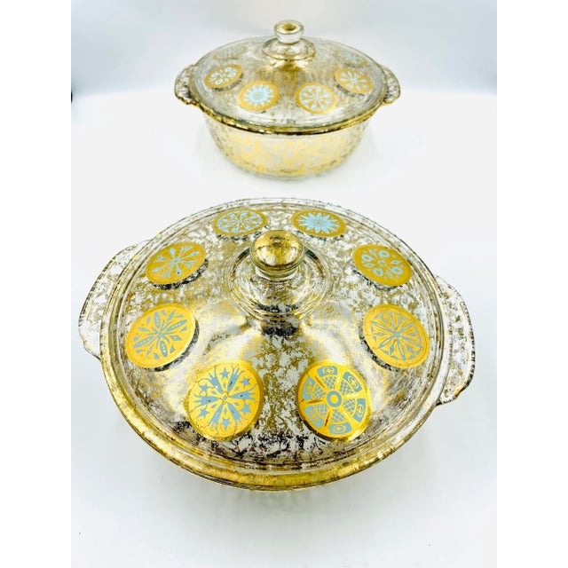 This is a gorgeous and rare pair of 2-quart casseroles/serving dishes that retain the original lid. These stunning...