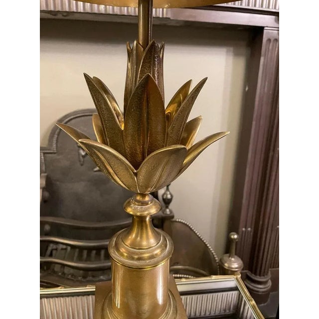 A signed and stamped Maison Charles bronze "Lotus" table lamp with original bronze shade. In good condition, circa 1970 so...