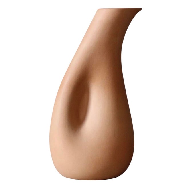 Elsa Peretti for Tiffany & Co. terracotta pottery carafe. Thumbprint, teardrop shape for an ergonomic type self handle....