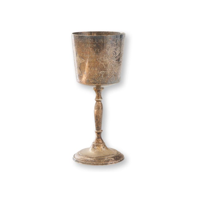 Early 20th century English trophy cup engraved Joy Rollins From Ye Olde Fishermans Lodge No 107 A.O.B. referring to the...