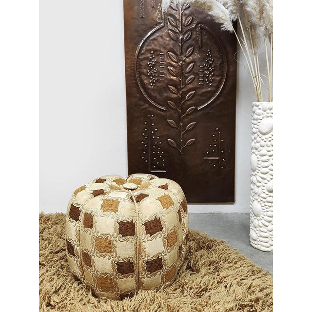 Czech design! This stylish vintage Tulip ottoman has a distinctive design that immediately catches the eye. Designed by...