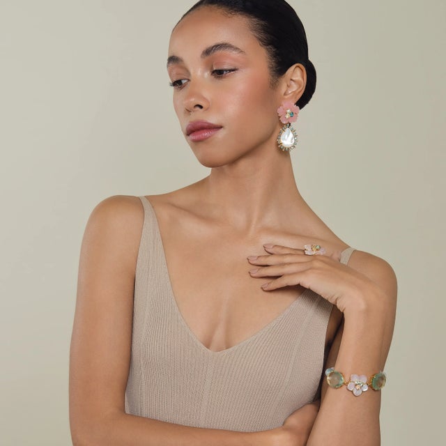 Matilda Bracelet — A fresh spring-inspired design featuring delicate beading and floral center accent. Feminine and full...