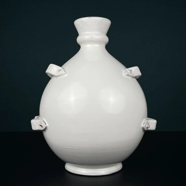 Large glazed ceramic vase by Gianfranco Ballerini made in Italy in the 1990s. Unusual design and shape. Glazed ivory...