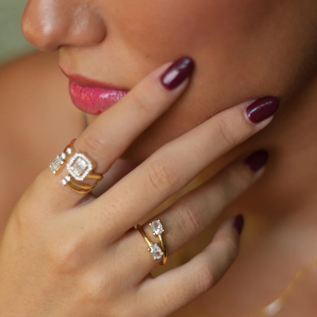 Elevate your style with this Double Diamond Stone & Gold Dainty Adjustable Ring, designed for both elegance and...