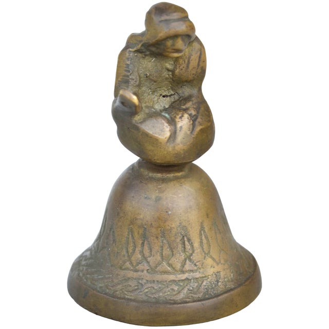 Antique highly crafted and detailed Americana bell accent, constructed of solid brass. Showcasing an elaborate handcrafted...
