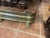 This is a very nice English elegant antique pierced brass curved fireplace fender having 3 lion paw feet. Very good...
