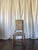 This set of six vintage dining chairs features warm wood frames with beautifully turned legs and stretcher details. The...