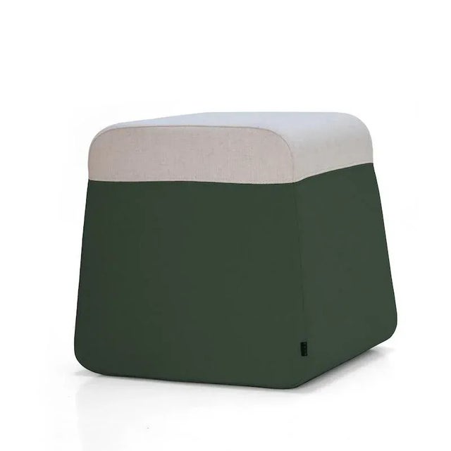 This fun and functional ottoman is available topped with felt or faux leather. The bottom comes in a variety of trendy...