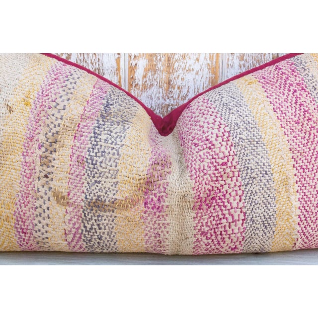 Quilted by the gypsy woman of the Saami community often reusing fabrics from clothing. This antique tribal pillow feature...