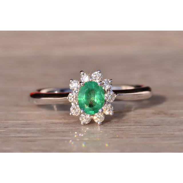 Contemporary The 89th Avenue: Natural Emerald and Diamond Halo Ring in White Gold For Sale - Image 3 of 10