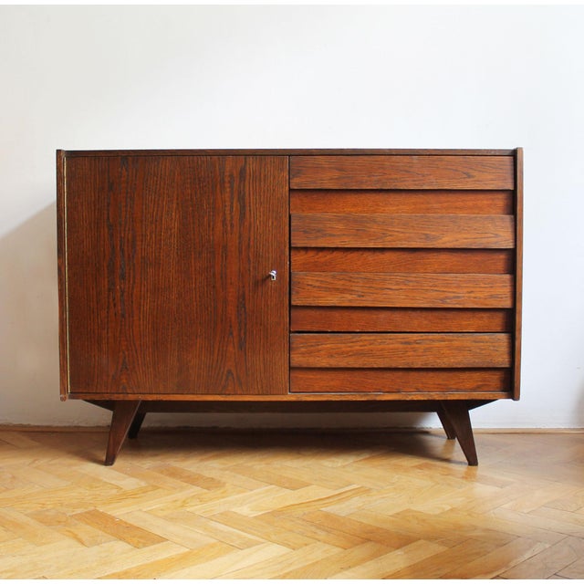 An original U-458 sideboard designed by celebrated Czech designer Jiří Jiroutek (1928–2023) and produced by Interiér Praha...