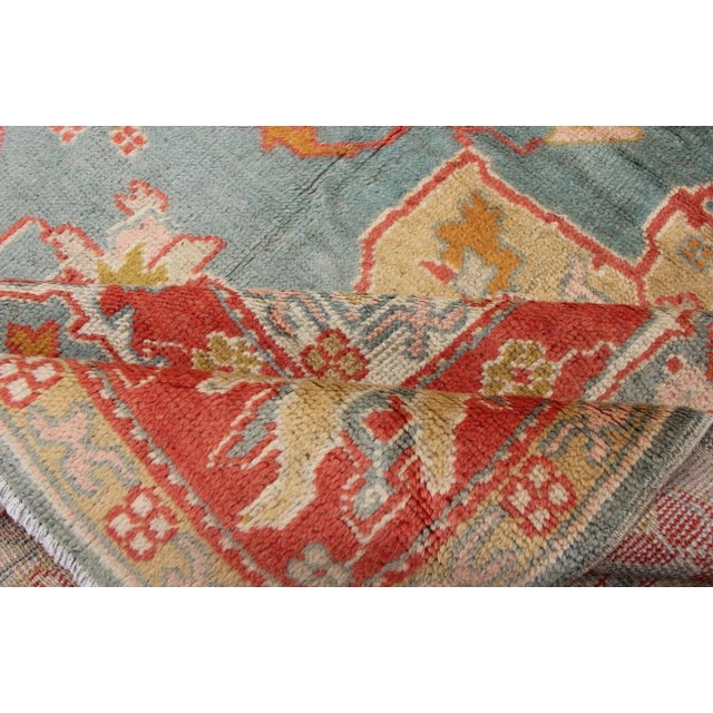 Antique Turkish Oushak Rug on a Blue Background and Orange-Red Color Border For Sale - Image 11 of 12