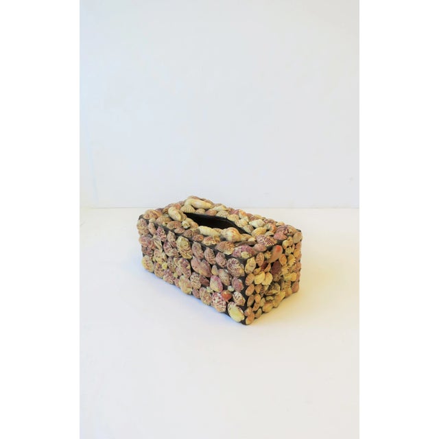A very beautiful seashell [sea shell] tissue box cover, circa 1960s. Box is wood and covered with scallop shells and other...