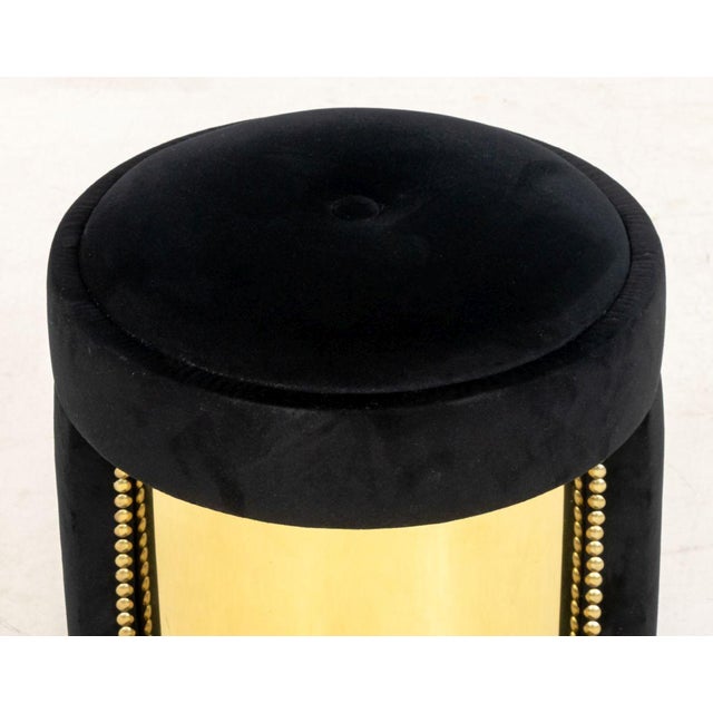 Luxxu "Armour Stool", button-tufted black velvet upholstered seat with riveted gilt brass elements. 17" H x 14.25"...