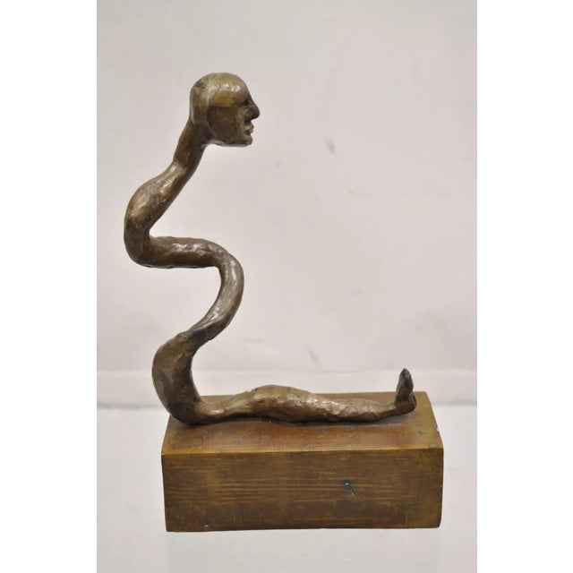 Sheryl Cannold Benjamin (American, 1924 - 2023) Brutalist Modern Abstract Bronze Serpent Figure Sculpture. Circa Late 20th...