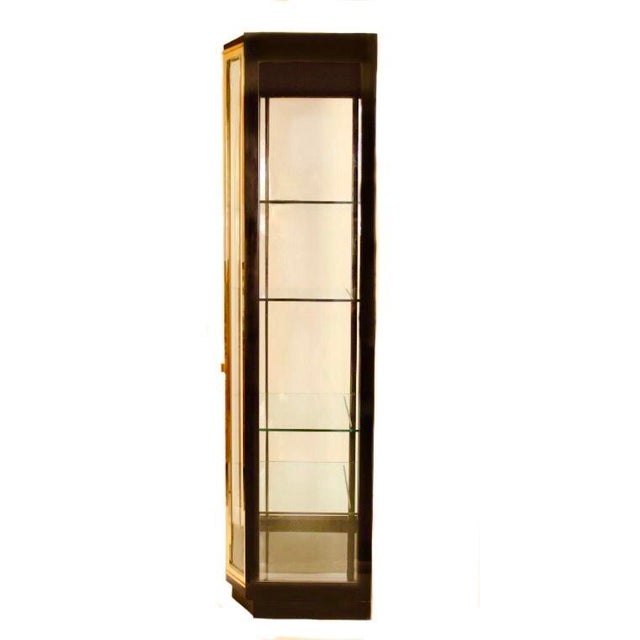 A treasure to hold treasures. Fun alternative for display in any space.. Glazed black lacquer, brass vitrine pulls,...