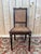 Set of eight Louis XVI style chairs in solid dark brown stained mahogany, richly ornamented with gilt bronze mounts. The...