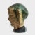 This bust is sculpted in the form of an Arhat, a Buddhist devotee who has attained enlightenment, also called a “Luohan.”...