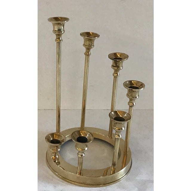 Nice modern design on this vintage brass Menorah candle holder.