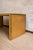 1970s desk featuring a bamboo structure with surfaces covered in woven rush. The top and side panels are finished with...