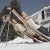 New England Skiing 1955 by Slim Aarons Slim Aarons Limited Estate Edition Two women recline on improvised sunbeds in...