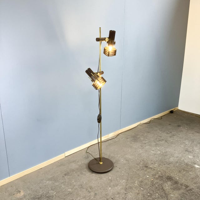 A cool vintage classic made in Germany. This practical floor lamp offers extremely flexible lighting options with its two...