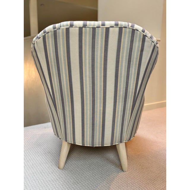 This is very comfortable chair - it’s the perfect chair for reading! It has a graceful curve to it and the tufting adds...