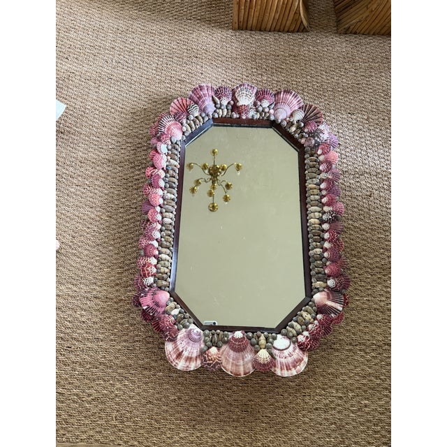 This beautiful antique shell mirror features an octagonal beveled mirror plate set within a handcrafted frame lavishly...